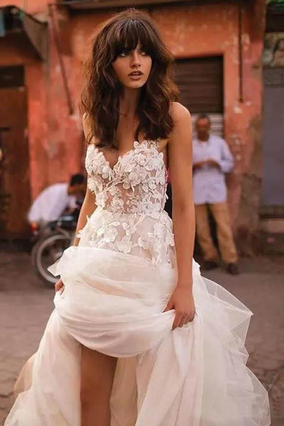 files/TulleA-lineSpaghettiStrapsBacklessWeddingDressesWithTrain_MW1040_1.jpg